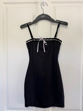 Katie J NYC Black Mini Slip Dress with Pink Bow